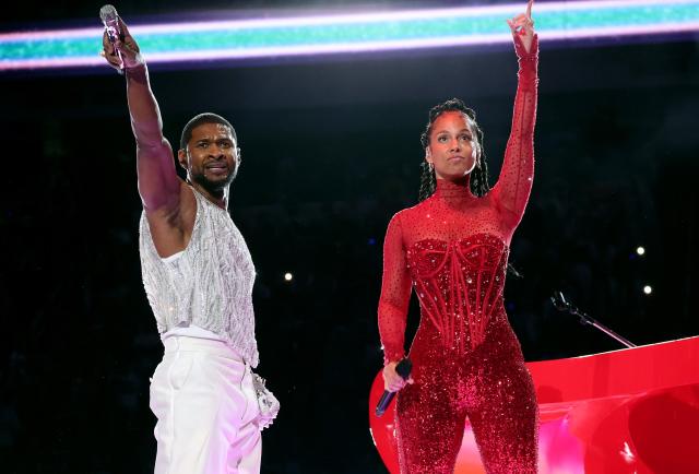 usher did not disappoint with his Super Bowl half-time show performance!  Starting off in a custom bejewelled white @dolcegabbana suit wi