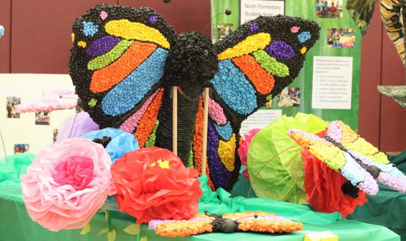 Mason Central Elementary School students used tissue paper to create a butterfly for the "Scaled Wings at Work" project during a previous Earth Day event in Monroe County.