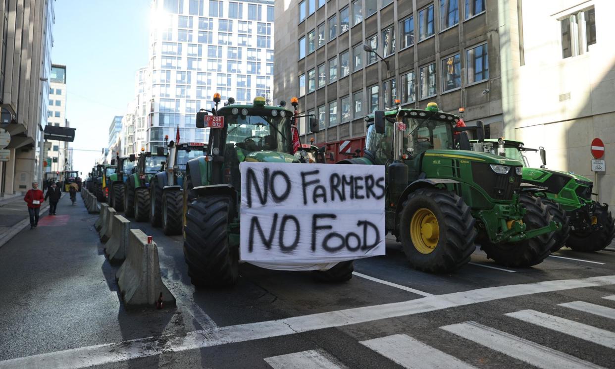 <span>A tractor blockade by angry farmers brought Brussels to a standstill on Thursday.</span><span>Photograph: Xinhua/Rex/Shutterstock</span>