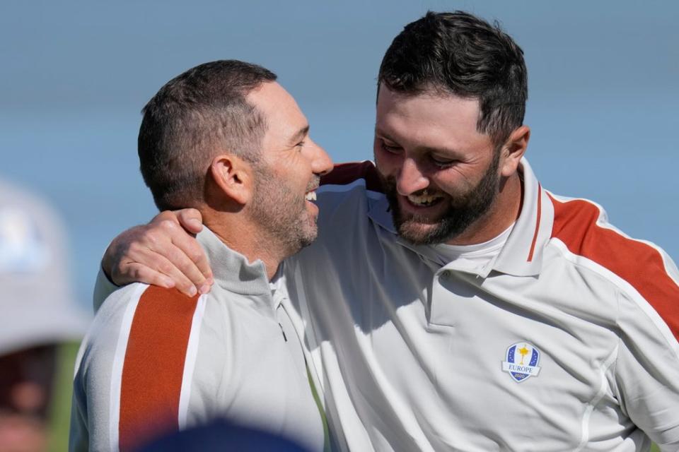 Sergio Garcia (left) and Jon Rahm celebrate after winning their foursomes match on day two of the Ryder Cup (Ashley Landis/AP) (AP)