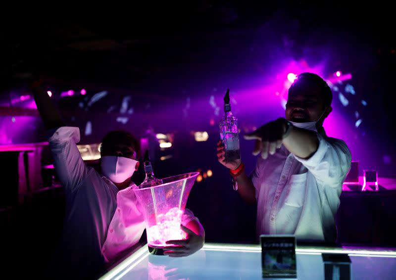 Junichi Hamana and Arjay Arai attend an LGBT event held at a club at Shibuya, following the COVID-19 outbreak, in Tokyo