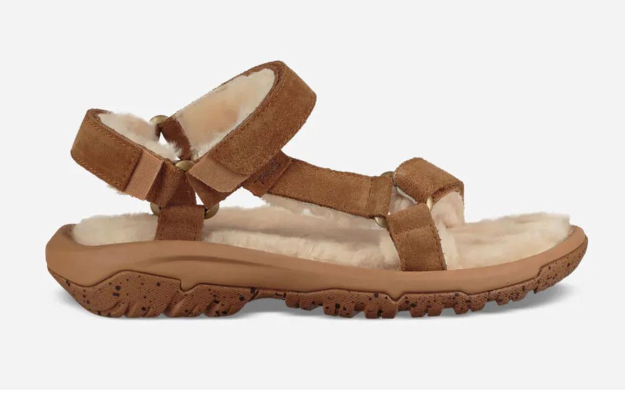 Get the <a href="https://www.teva.com/women-sandals/hurricane-shearling/1103273.html" target="_blank" rel="noopener noreferrer">Teva hurricane shearling sandal</a> for $90.