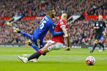 Britain Football Soccer - Manchester United v Leicester City - Barclays Premier League - Old Trafford - 1/5/16 Leicester City's Riyad Mahrez in action with Manchester United's Marcos Rojo Reuters / Darren Staples Livepic