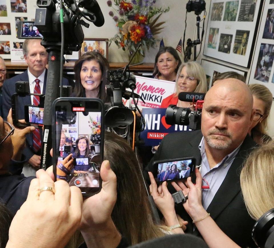 Oct 13, 2023; Concord, NH, USA; Republican presidential candidate Nikki Haley files paperwork at the New Hampshire State House to get on the New Hampshire 2024 Republican presidential primary ballot.