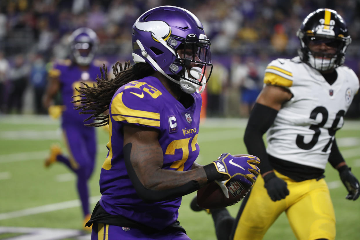 Minnesota Vikings running back Dalvin Cook (33) runs against the Pittsburgh Steelers during the first half of an NFL football game, Thursday, Dec. 9, 2021, in Minneapolis. (AP Photo/Bruce Kluckhohn)