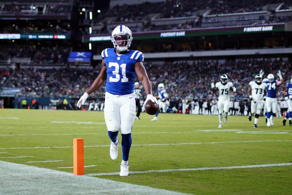 Indianapolis Colts running back Kenyan Drake (31) scores a touchdown during the second half of an NFL preseason football game against the Philadelphia Eagles on Thursday, Aug. 24, 2023, in Philadelphia. (AP Photo/Matt Rourke)