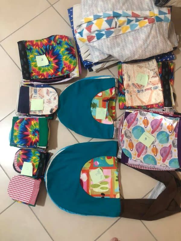 Various completed animal pouches for animals affected by Australia bushfires are packed for shipping in this January 5, 2020 image obtained via social media, in Regents Park, Queensland