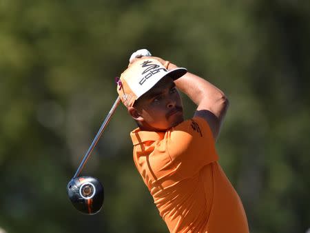 Aug 28, 2016; Farmingdale, NY, USA; Rickie Fowler watches his tee shot on the sixth hole during the final round of The Barclays golf tournament at Bethpage State Park - Black Course. Mandatory Credit: Eric Sucar-USA TODAY Sports