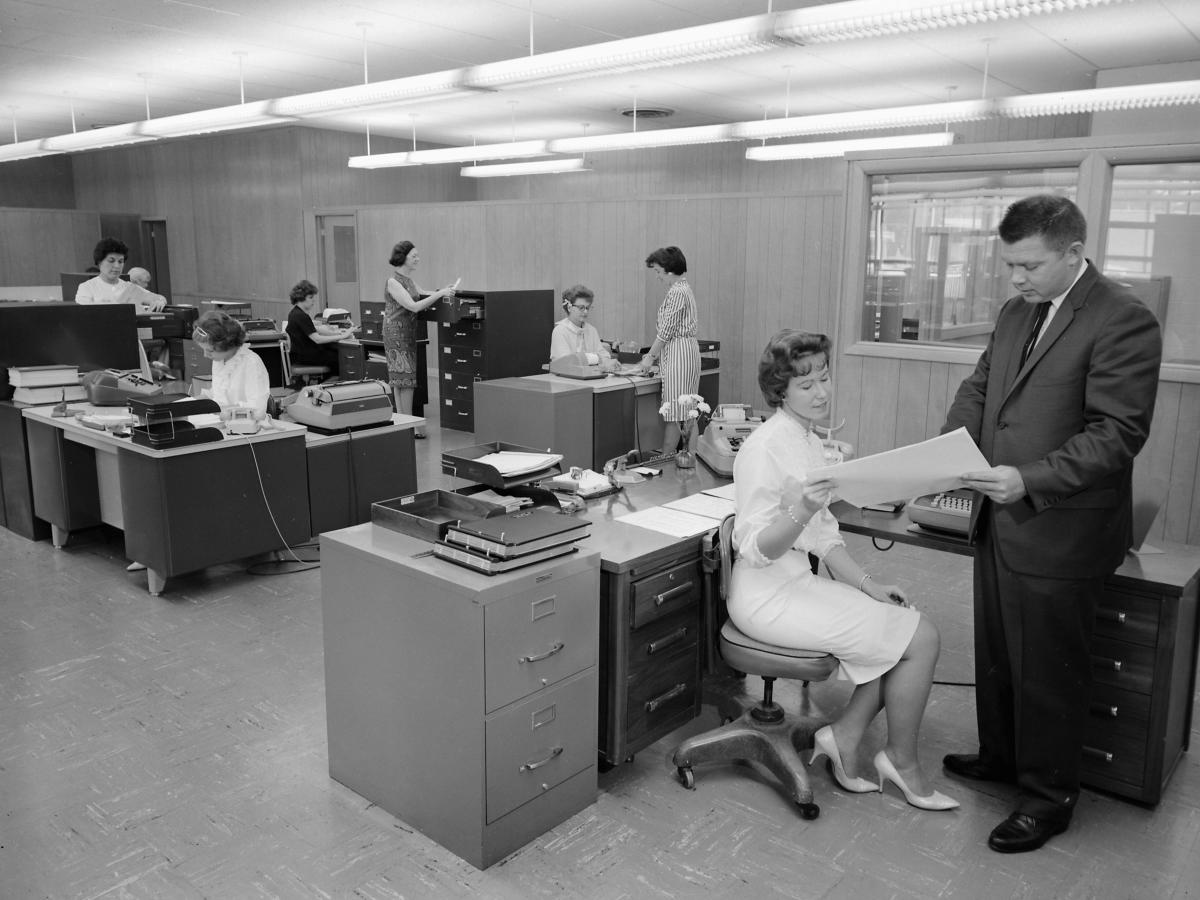 Woman Working At Typewriter by George Marks