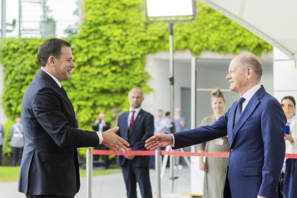 German Chancellor Olaf Scholz, right, and Portugal's Prime Minister Luis Montenegro shake hands during their meeting at the Federal Chancellery in Berlin, Friday, May 24, 2024. (Christoph Soeder/dpa via AP)