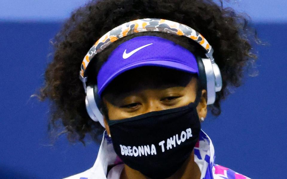 Naomi Osaka of Japan wears a mask with Breonna Taylor's name on it as she arrives to play Misaki Doi of Japan in their match on the first day of the US Open Tennis Championships at the USTA National Tennis Center in Flushing Meadows, New York, USA, 31 August 2020. Due to the coronavirus pandemic, the US Open is being played without fans and runs from 31 August through 13 September. 2020 US Open Tennis Championships in New York - JASON SZENES/EPA-EFE/Shutterstock 