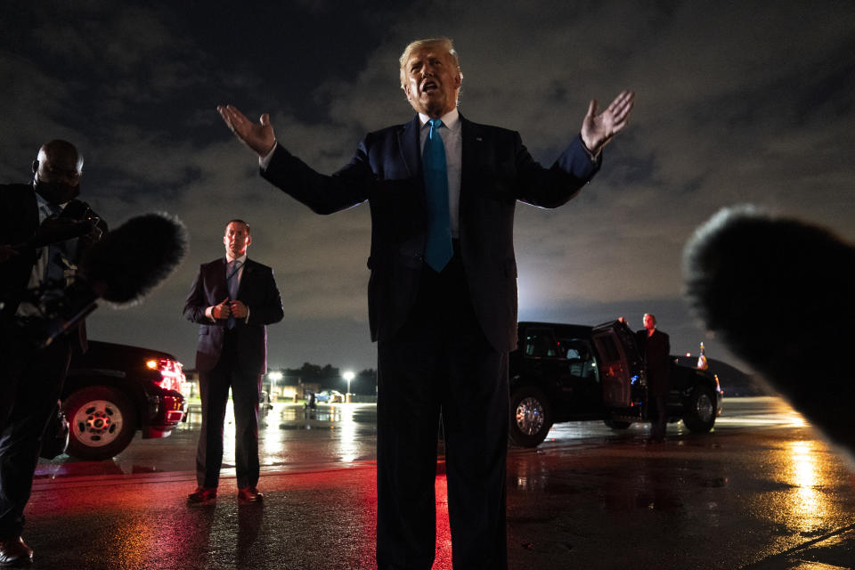 President Donald Trump talks with reporters at Andrews Air Force Base after attending a campaign rally in Latrobe, Pa., Thursday, Sept. 3, 2020, at Andrews Air Force Base, Md. (AP Photo/Evan Vucci)