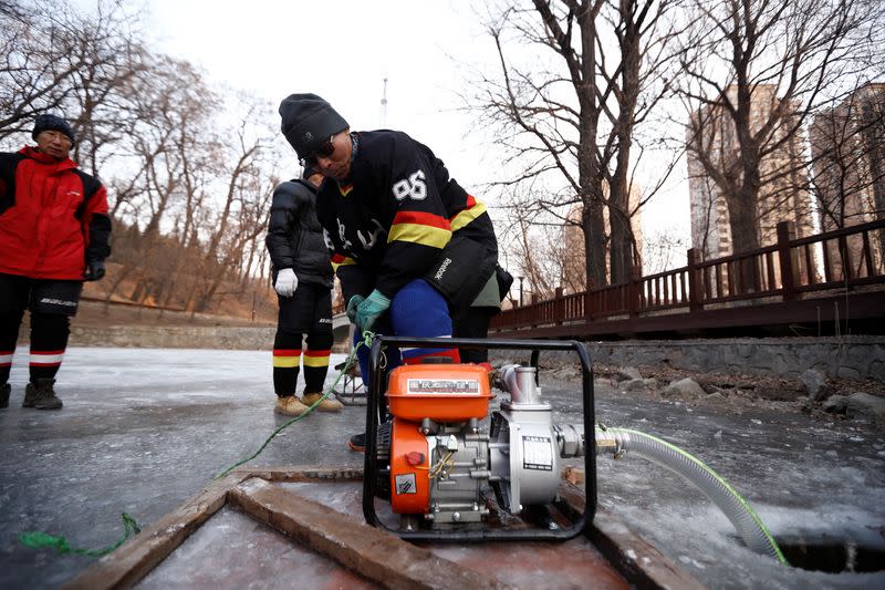 The Wider Image: On a frozen pond far from the Olympics, meet China's ice hockey veterans