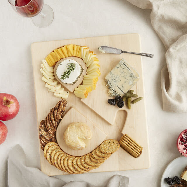 A couple that always entertains needs the right cheeseboard. <a href="https://fave.co/2SXAaji" target="_blank" rel="noopener noreferrer">Get it at Uncommon Goods</a>.