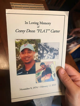 Corey Carter is pictured on his funeral program in Valliant, Oklahoma, U.S. October 25, 2017. Picture taken October 25, 2017. REUTERS/Charles Levinson
