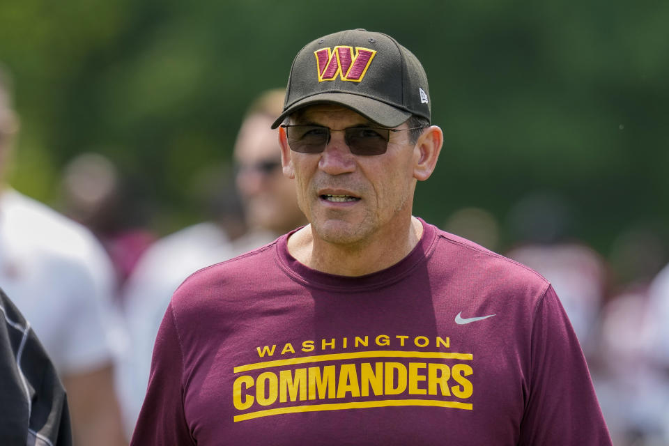 FILE - Washington Commanders head coach Ron Rivera walks after an NFL football practice at the team's training facility, Wednesday, May 24, 2023 in Ashburn, Va. The Washington Commanders go into a fourth training camp under coach Ron Rivera with second-year pro Sam Howell opening as the starting quarterback. (AP Photo/Alex Brandon, File)