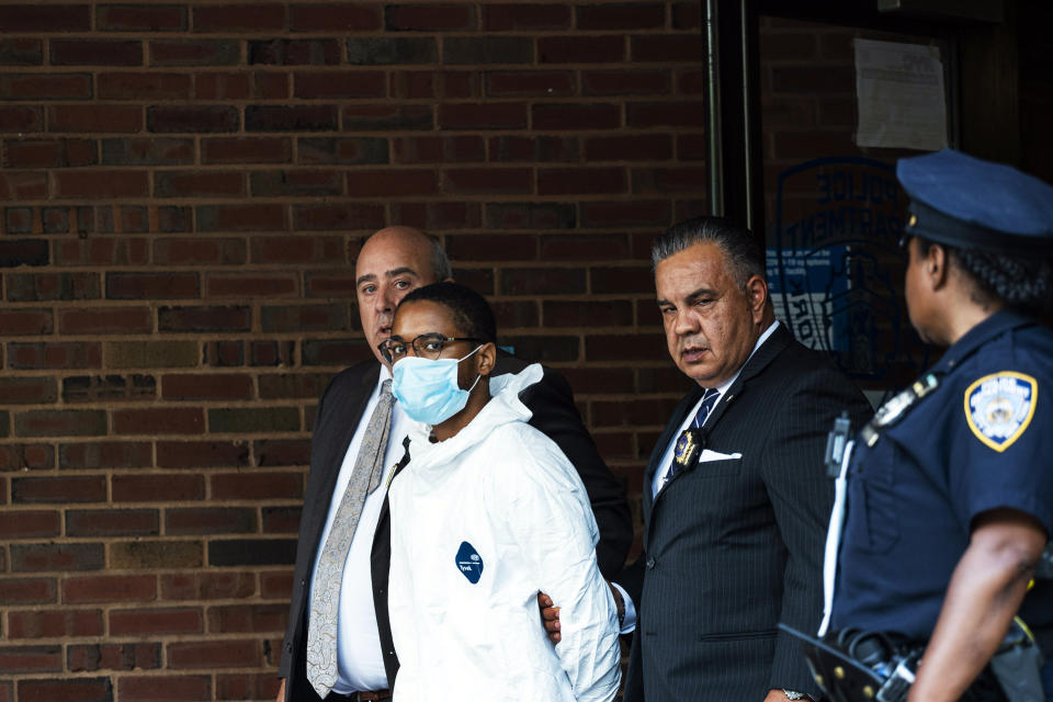 Tyrese Haspil, 21, is escorted out of the 7th precinct by NYPD detectives, Friday, July 17, 2020, in New York. Haspil faces a murder charge in the death of Fahim Saleh, 33-year-old tech entrepreneur who was found dismembered inside his luxury Manhattan condo. (AP Photo/Eduardo Munoz Alvarez)