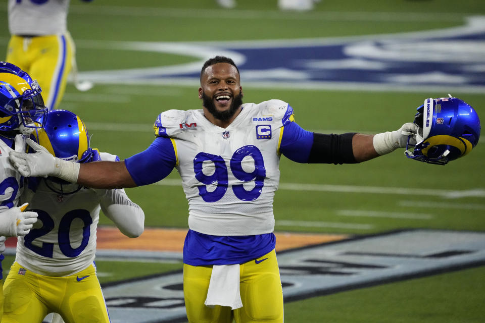 Los Angeles Rams defensive end Aaron Donald (99) celebrates after the NFL Super Bowl 56 football game against the Cincinnati Bengals, Sunday, Feb. 13, 2022, in Inglewood, Calif. (AP Photo/Elaine Thompson)