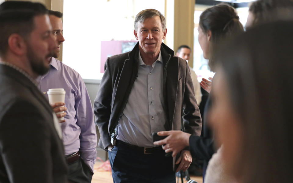 Former Democratic Colorado Governor John Hickenlooper arrives for a meeting with AmeriCorps members prior to a roundtable campaign stop in Manchester, N.H., Friday, March 22, 2019. Hickenlooper joined the 2020 Presidential race earlier in the month. (AP Photo/Charles Krupa)