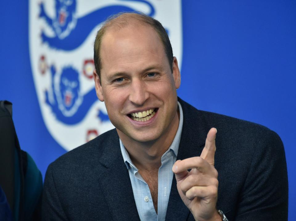 Prince William, Prince of Wales wearing a suit during a visit to England's national football centre, on October 5, 2022.