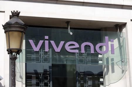 The Vivendi logo is pictured at the main entrance of the entertainment-to-telecoms conglomerate headquarters in Paris March 14, 2014. REUTERS/Charles Platiau