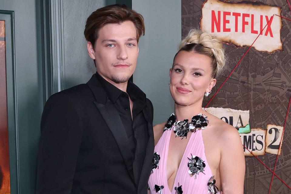 <p>Monica Schipper/Getty Images</p> Jake Bongiovi and Millie Bobby Brown at the 