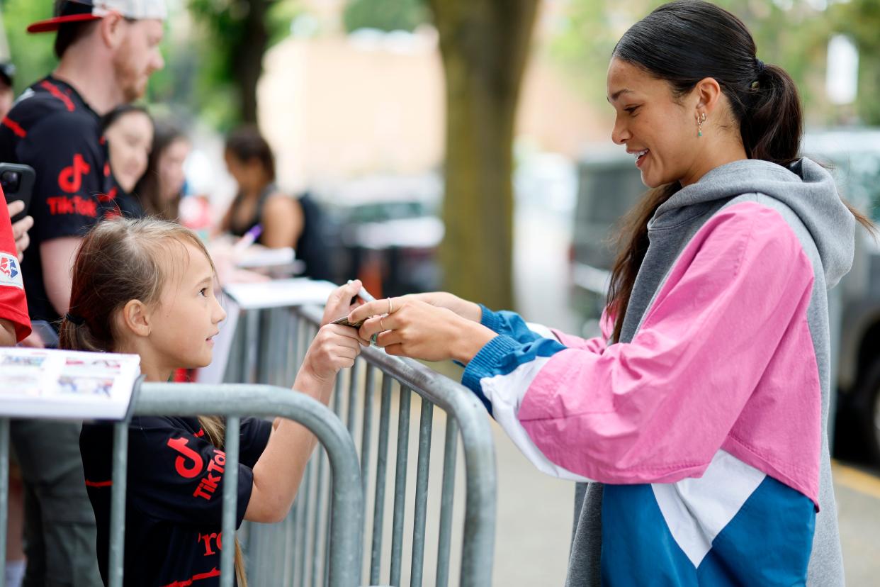 Sophia Smith signs autographs for young fans before a Portland Thorns match against the Chicago Red Stars in  May.