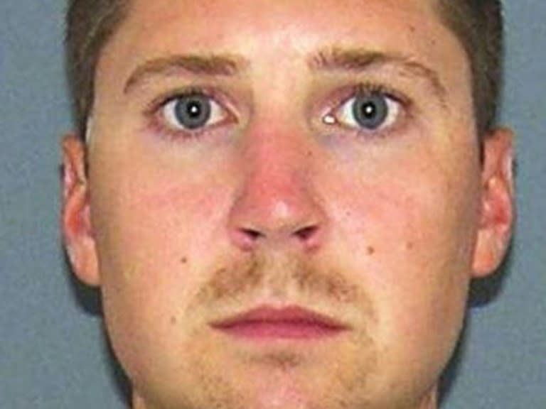 This July 29, 2015 booking photo provided by the Hamilton County Justice Center in Cincinnati, Ohio shows University of Cincinnati police officer Ray Tensing