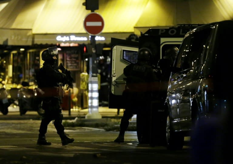 Police man a position close to the Bataclan theatre on November 13, 2015 after a series of gun attacks across Paris