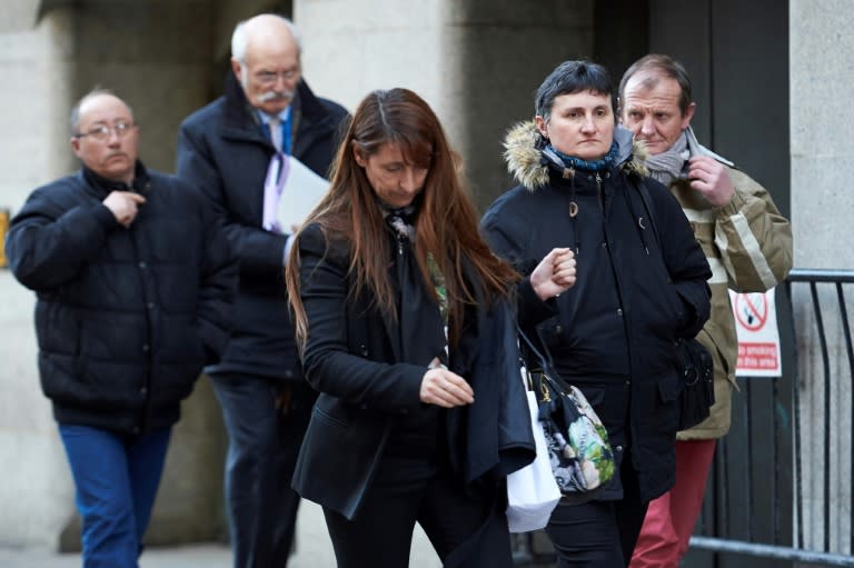 The family of murdered French au-pair Sophie Lionnet leave court in London, where her compatriot employers are on trial accused of burning her body in a bonfire