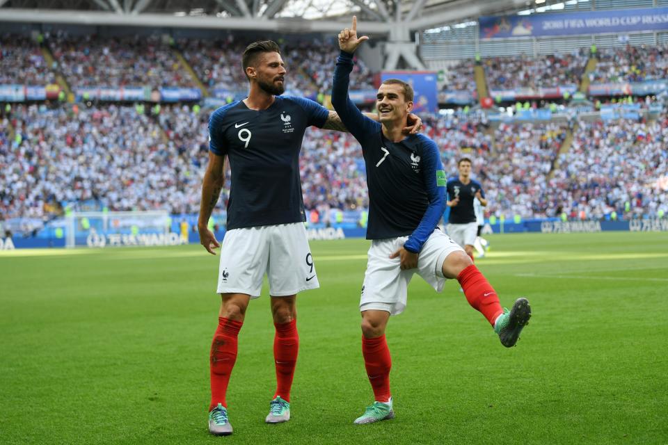 <p>Antoine Griezmann celebrates with Olivier Giroud after scoring France’s first goal </p>