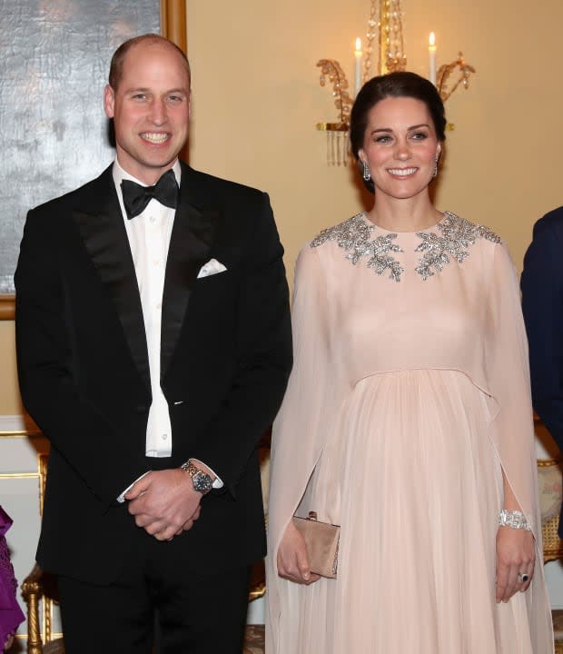 <p>The standout fashion from the Cambridges' 2018 visit to Scandinavia was the absolutely bananas cape-dress that Kate Middleton wore to dinner at the Royal Palace. The Alexander McQueen gown featured a sheer cape and a crystal-embellished neckline. Kate finished the look off with <strong><a href="https://parade.com/tag/queen-elizabeth" rel="nofollow noopener" target="_blank" data-ylk="slk:Queen Elizabeth II" class="link ">Queen Elizabeth II</a></strong>’s Wedding Gift Bracelet, a geometric art deco-esque diamond piece that was commissioned by her husband <strong><a href="https://parade.com/tag/prince-philip" rel="nofollow noopener" target="_blank" data-ylk="slk:Prince Philip" class="link ">Prince Philip</a></strong> as a wedding present in 1947.</p>