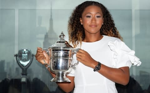 Osaka with her US Open title - Credit: Reuters