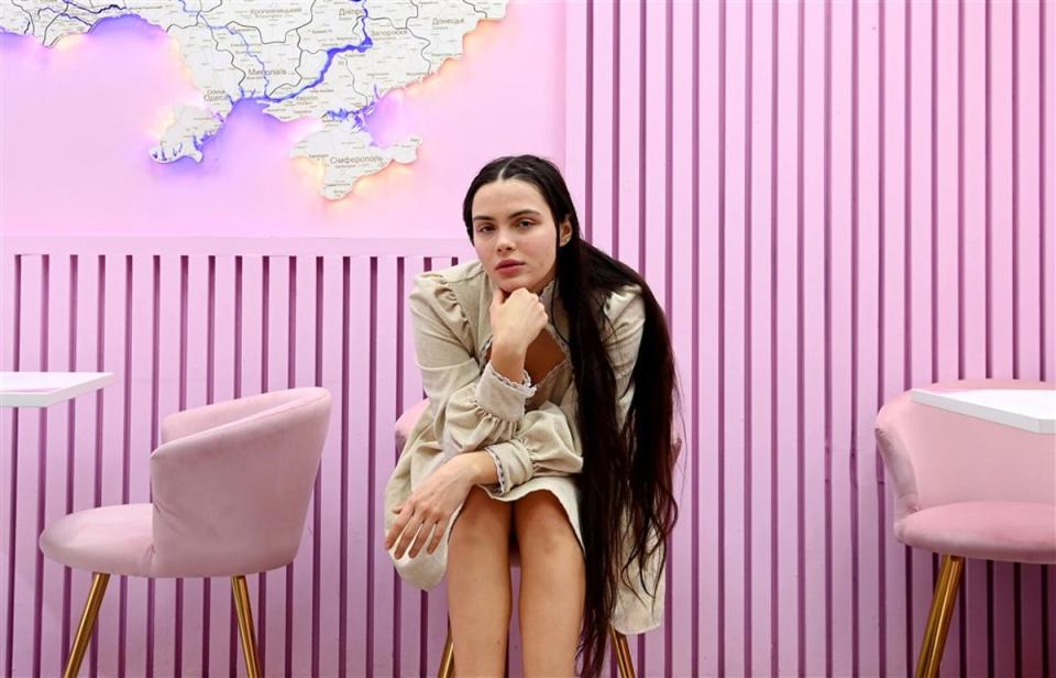 Yelyzaveta Tataryna, known as Lisa, eein her business, a vegan female-safe space cafe in London (EPA)