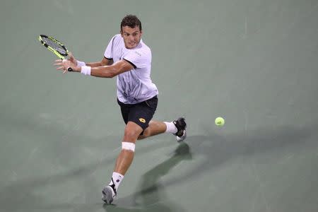 Sep 1, 2016; New York, NY, USA; Alessandro Giannessi of Italy hits a backhand against Stan Wawrinka of Switzerland (not pictured) on day four of the 2016 U.S. Open tennis tournament at USTA Billie Jean King National Tennis Center. Wawrinka won 6-1, 7-6(4), 7-5. Mandatory Credit: Geoff Burke-USA TODAY Sports