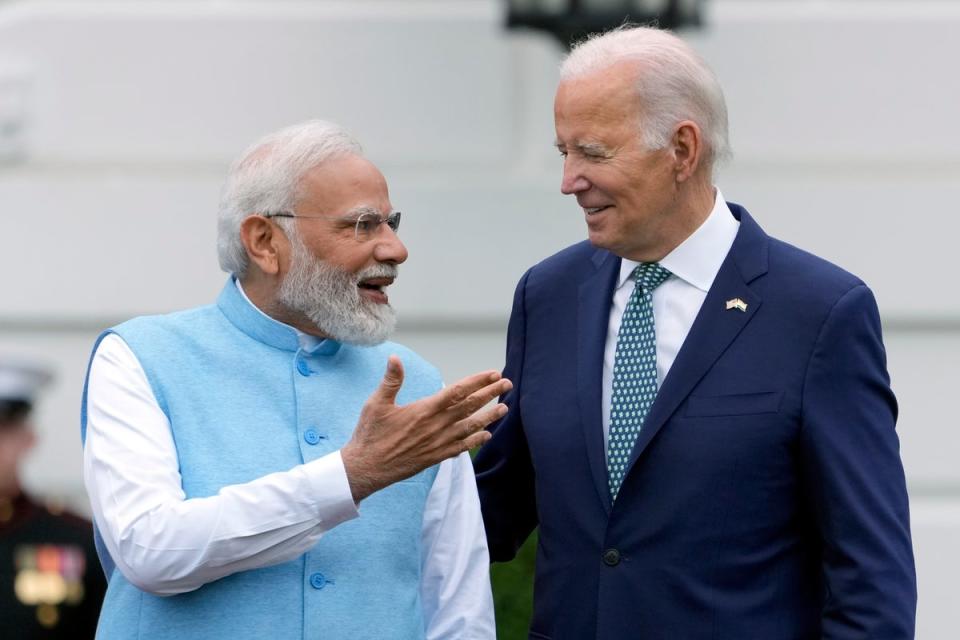 India’s Prime Minister Narendra Modi and US President Joe Biden during a State Arrival Ceremony at the White House (AP)