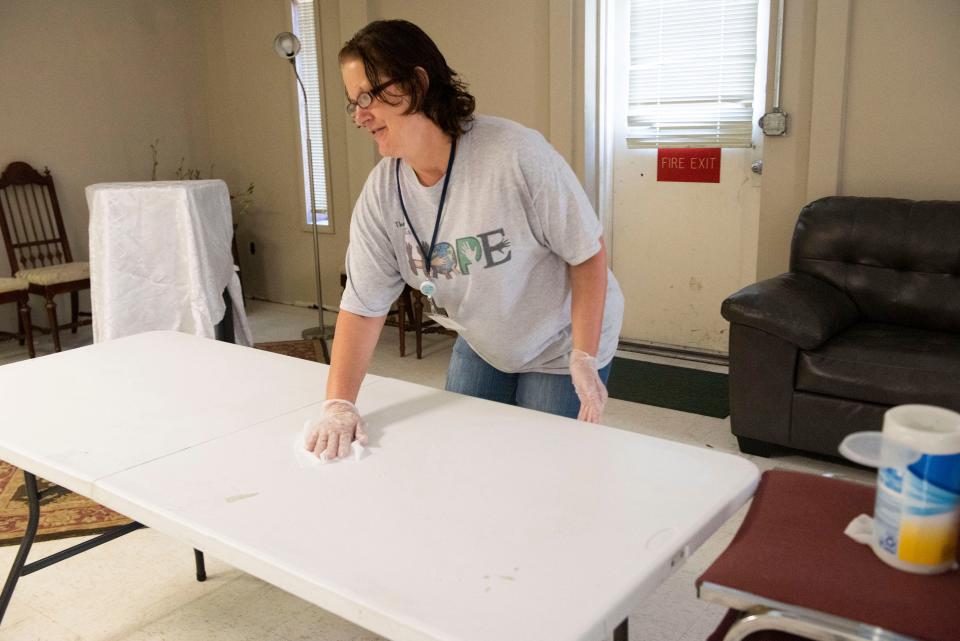 Mary Ridgell volunteers at There Is Hope Rehabilitation Living Facility in Pensacola on Nov. 18. Ridgell, who was once homeless, volunteers at the shelter to give back and provide inspiration to others.