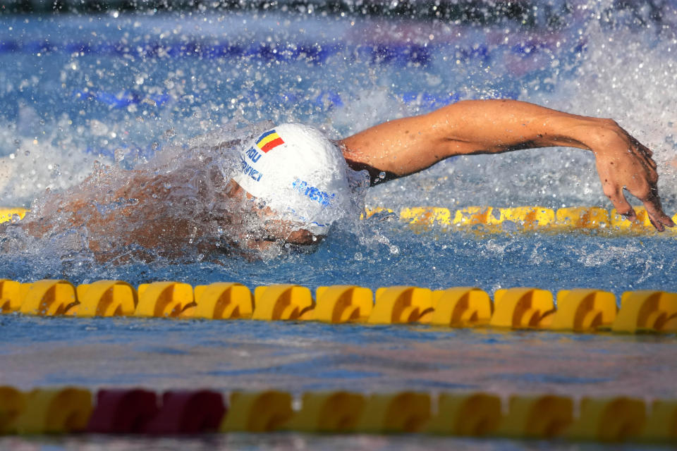 RESENDING TO PROVIDE AN ALTERNATIVE CROP OF AJM190 - Romania's David Popovici competes during the men's 100m freestyle final at the European swimming championships, in Rome, Saturday, Aug. 13, 2022. (AP Photo/Andrew Medichini)