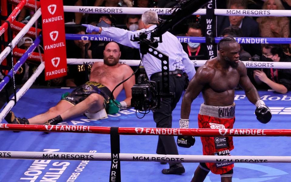 Tyson Fury knocked down by Deontay Wilder