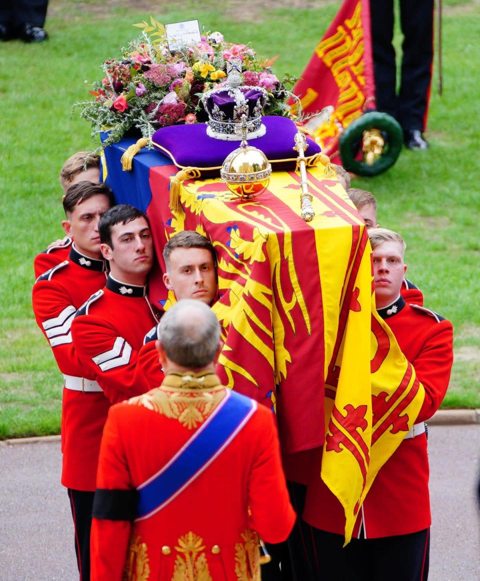 Bearers carry the coffin of Queen Elizabeth II into St George’s Chapel in Windsor Castle (Ben Birchall/PA) (PA Wire)