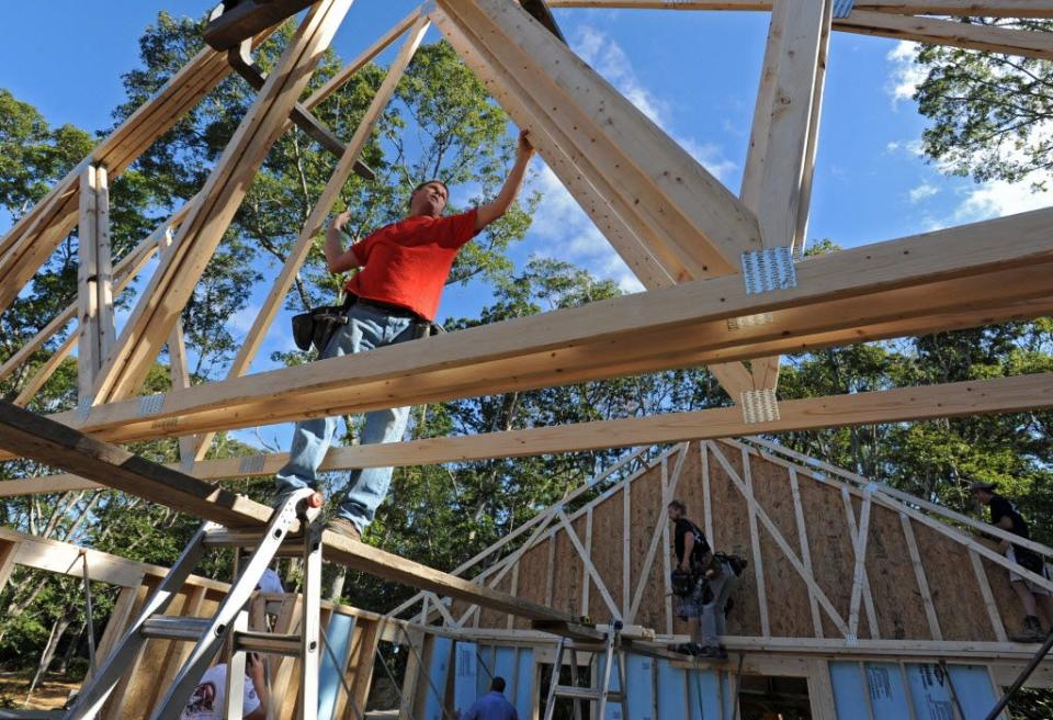 Brian Graham of Sandwich installs the roof framing on the first day of a Habitat for Humanity of Cape Cod Blitz Build in Orleans in this 2013 file photo. From Sept. 19-23, the Home Builders and Remodelers Association of Cape Cod are scheduled to complete a Blitz Build for Habitat for Humanity Cape Cod in Falmouth.