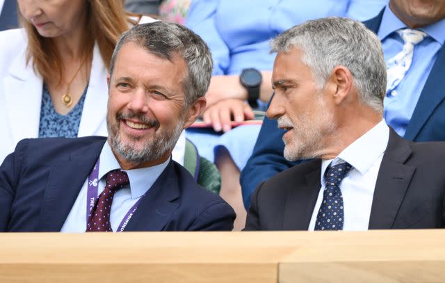 <p>Karwai Tang/WireImage</p> Crown Prince Frederik of Denmark (left) attends day eight of Wimbledon at All England Lawn Tennis and Croquet Club on July 10, 2023.