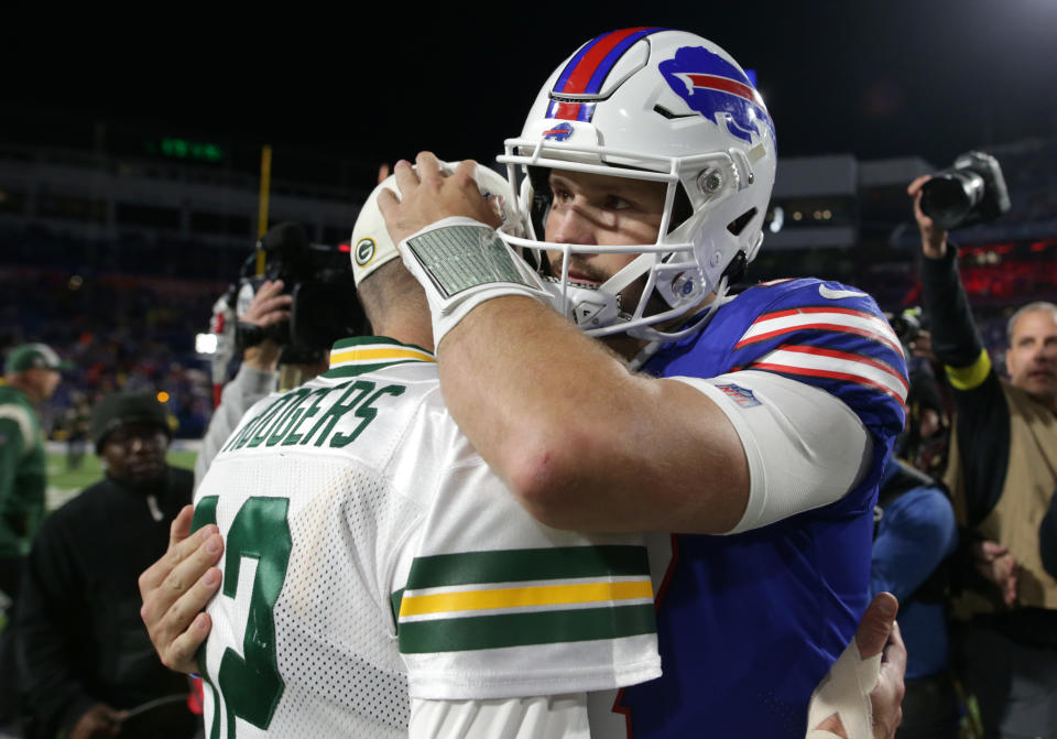 ORCHARD PARK, NEW YORK - OCTOBER 30: Josh Allen #17 of the Buffalo Bills and Aaron Rodgers #12 of the Green Bay Packers talk after their game at Highmark Stadium on October 30, 2022 in Orchard Park, New York. (Photo by Joshua Bessex/Getty Images)