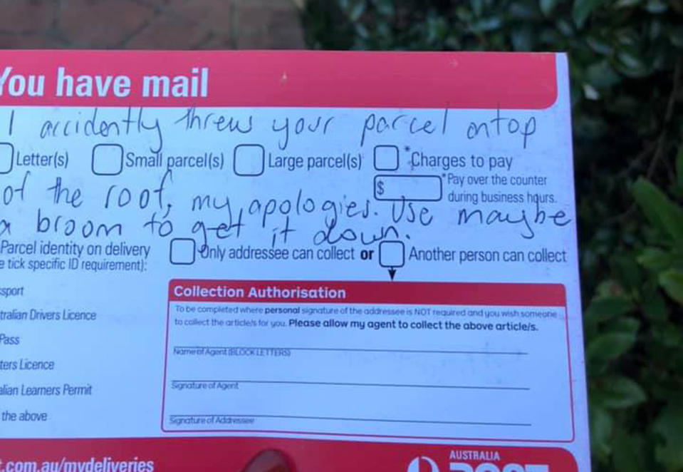 An Australia Post parcel notice with a handwritten note. The note claims the parcel was thrown on the roof of a Castle Hill home by accident.