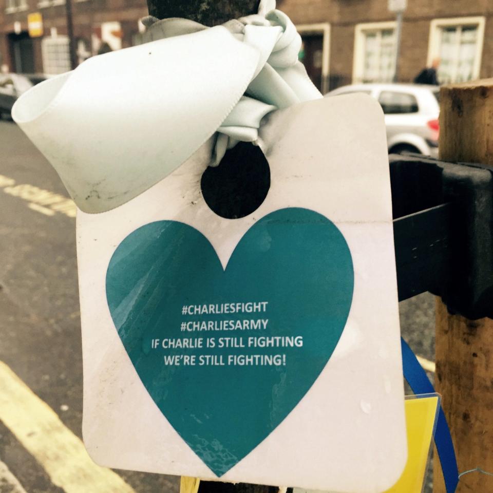 Ribbons and hearts tied to trees outside Great Ormond Street Hospital in London by well wishers backing a campaign to allow terminally ill baby Charlie Gard to be treated in America - Credit: PA