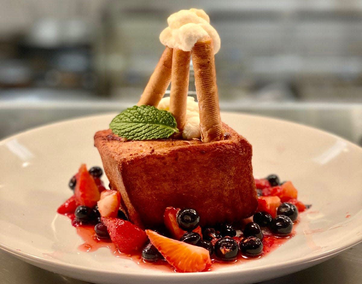 Titanic French toast with pastry cream, fruit jams, berries, raspberry sauce, cigarette wafers and maple syrup at Red Horse in Rumson.