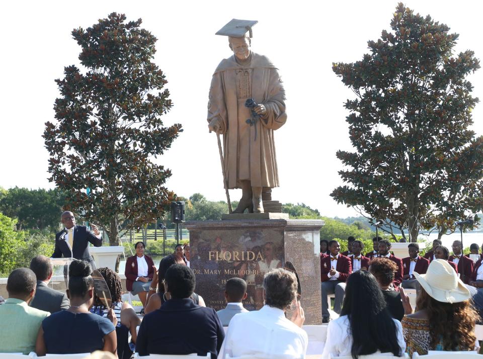 The new bronze Mary McLeod Bethune statue made in Italy has finally made it home. The 8-foot-tall statue, which stands on a 5-foot-tall granite pedestal, was unveiled at a ceremony Thursday morning on Daytona Beach's Riverfront Esplanade. Pictured is Mayor Derrick Henry speaking to the hundreds of people who gathered at the new plaza made for the statue.