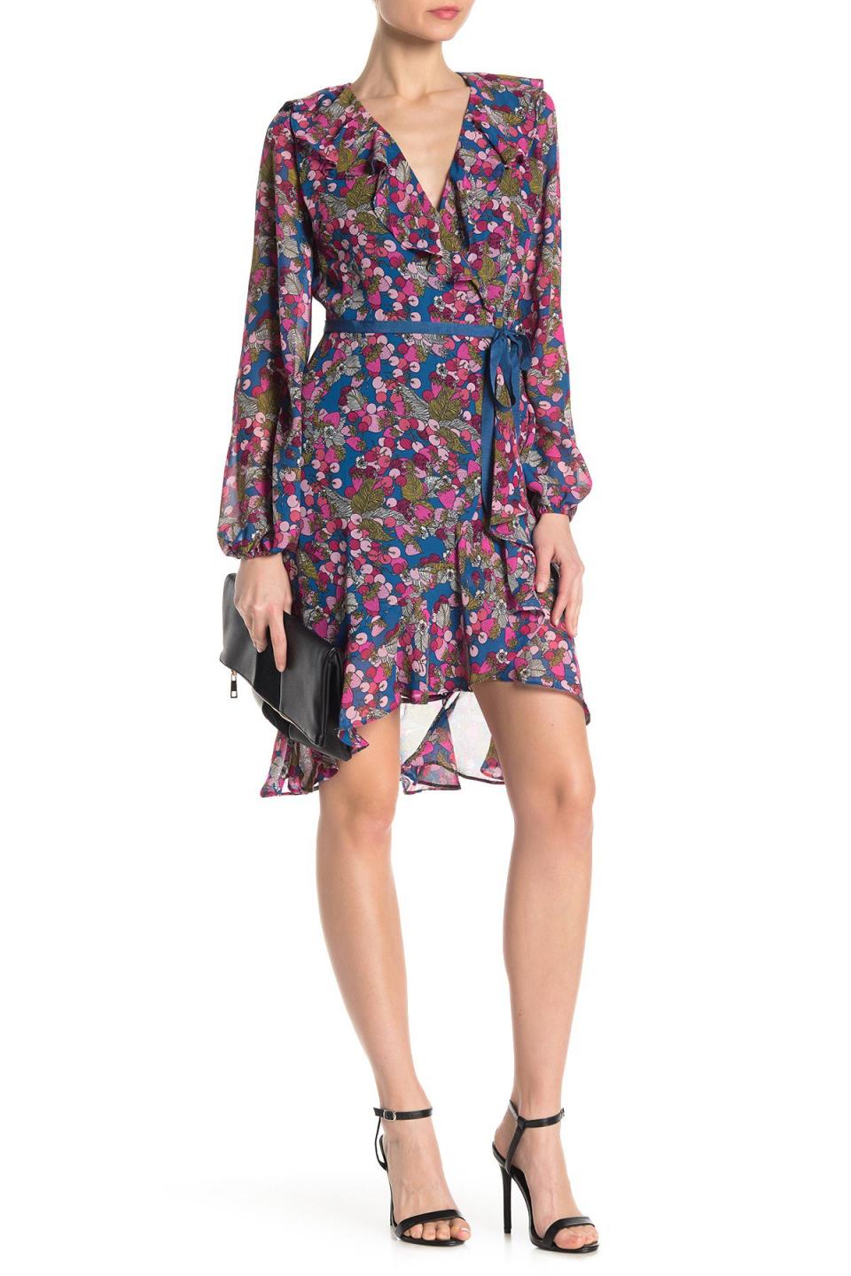 <b>Buy It!</b> Betsey Johnson Cherry Print Wrap Dress, $49.97 (orig. $128); <a href="http://www.pjatr.com/t/8-10134-131940-120793?sid=PEO%2CShopping%3A15GorgeousWrapDressestoShopThisSummer%2CInspiredbyMeghanMarkleandMoreCelebs%2Crcarhart31%2CUnc%2CGal%2C7085788%2C201905%2CI&url=https%3A%2F%2Fwww.nordstromrack.com%2Fshop%2Fproduct%2F2783608%2Fbetsey-johnson-cherry-print-wrap-dress%3Fcolor%3DTEAL%20MULTI" rel="nofollow noopener" target="_blank" data-ylk="slk:nordstromrack.com;elm:context_link;itc:0;sec:content-canvas" class="link ">nordstromrack.com</a>