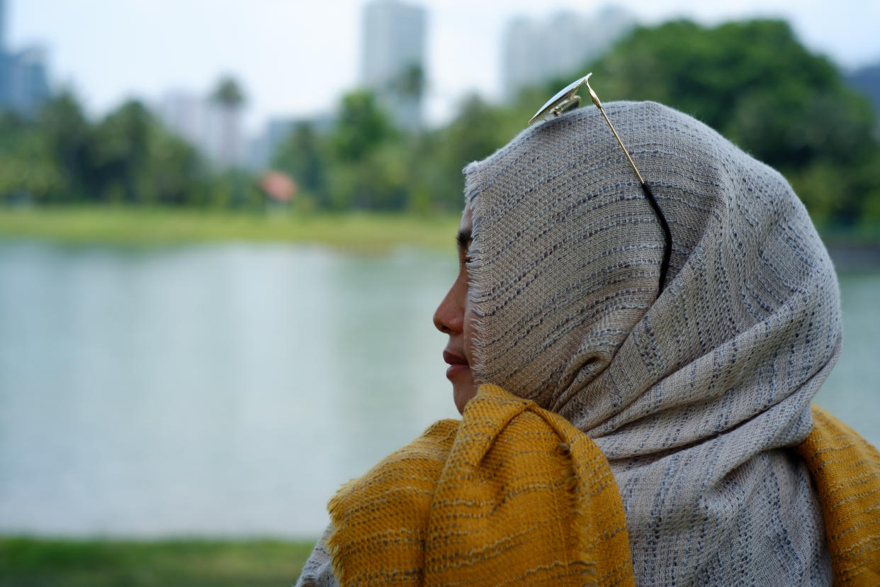 A posed photo of a woman in Singapore wearing a tudung. (PHOTO: Getty Images)