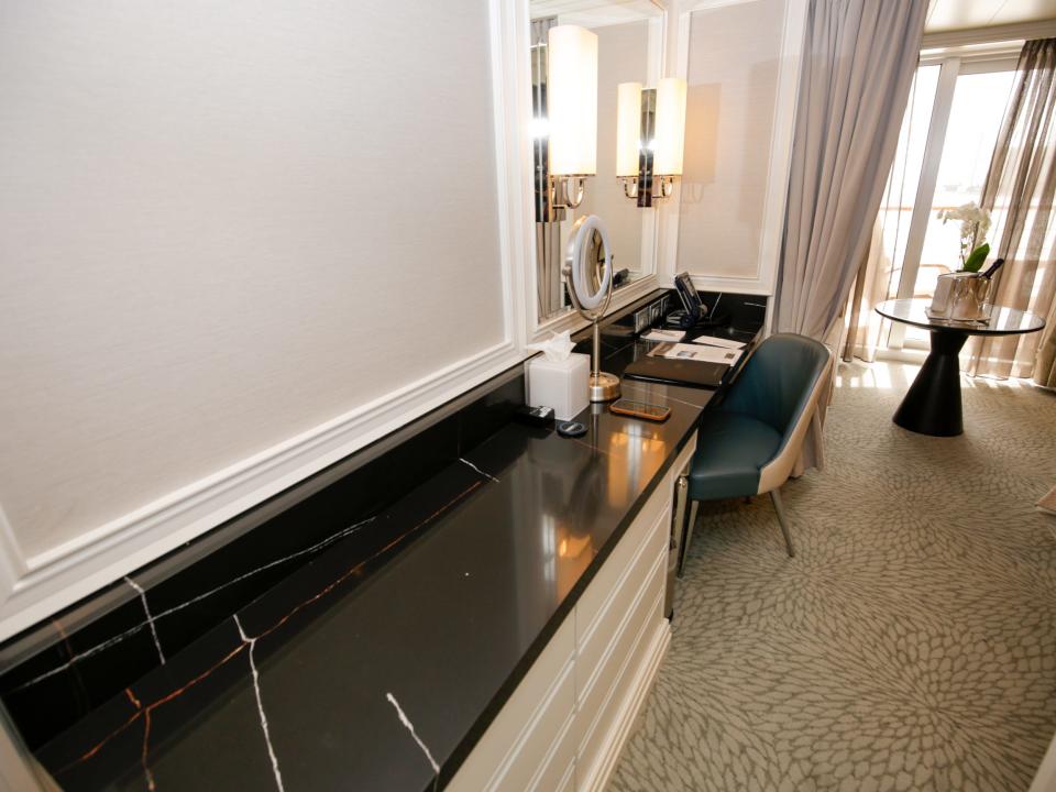 desk in Regent Seven Seas Grandeur's concierge suite